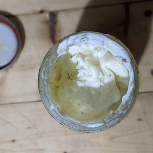 Aerial view of homemade mayonnaise in a quart jar